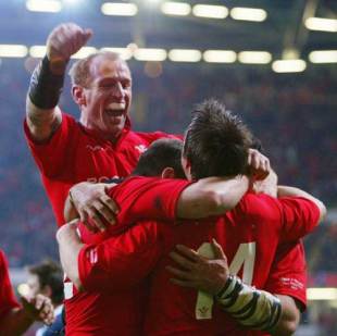 Wales winger Rhys Williams is congratulated after scoring a try against Scotland at the Millennium Stadium, February 14 2004