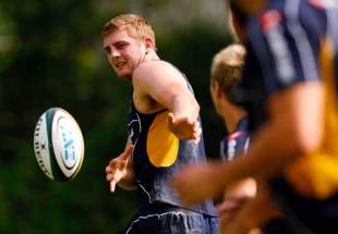 Dean Mumm of the Wallabies passes the ball during an Australian Wallabies training session at the Sookunpoo Sports Ground in Hong Kong, China on October 28, 2008.