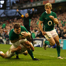 Ireland centre Brian O'Driscoll dives in at the corner