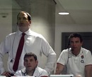 The England management look on in shock 