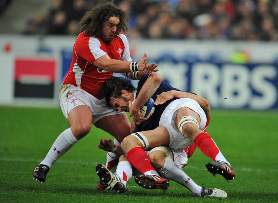 France's Julien Pierre is felled by the Wales defence