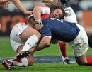 Wales' Adam Jones gets to grips with France's William Servat