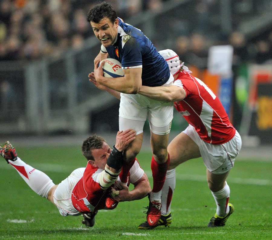 France's Damien Traille exploits a gap in the Wales defence