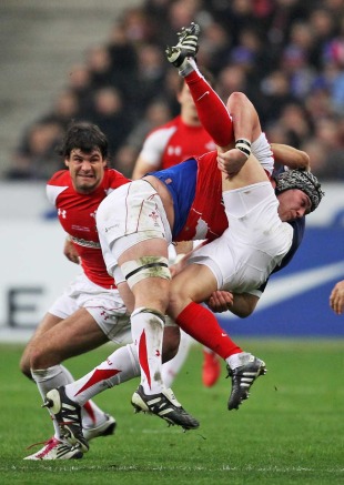 Wales' Dan Lydiate tackles France's Morgan Parra