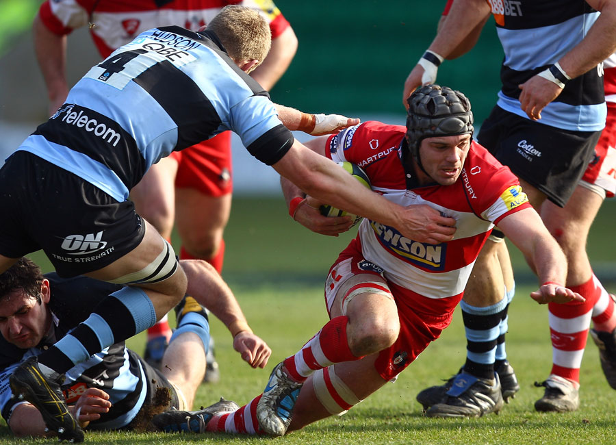 Newcastle's James Hudson attempts to stop Gloucester's Andy Hazell