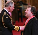 Former RFU chief executive Francis Baron receives his CBE from the Prince of Wales