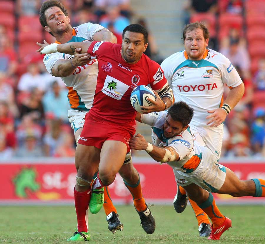 The Red's Digby Ioane breaches the Cheetahs' defence, Reds v Cheetahs, Super Rugby, Suncorp Stadium, Brisbane, Australia, March 26, 2011