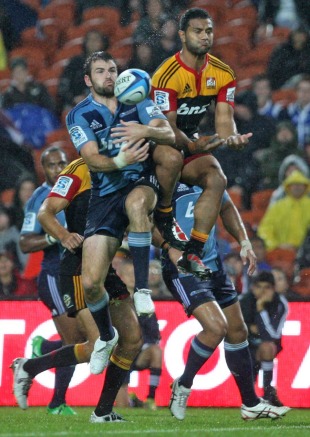 The Blues' Jared Payne and the Chiefs' Lelia Masaga compete for the ball, Chiefs v Blues, Super Rugby, Waikato Stadium, Hamilton, New Zealand, March 26, 2011