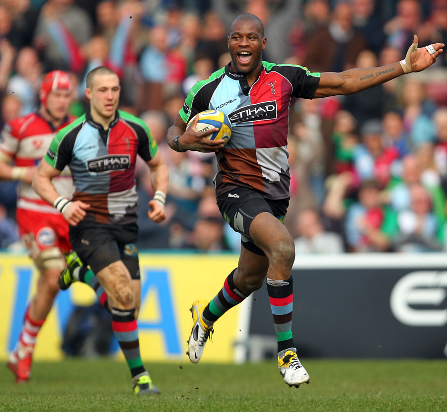 Harlequins wing Ugo Monye celebrates on his way to the try-line