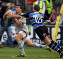 Bath's Butch James launches himself at Ben Youngs of Leicester 