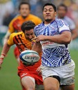 Samoa's Alafoti Faosiliva out paces England's Ben Gollings