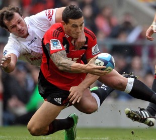 The Crusaders' Sonny Bill Williams off loads the ball in the tackle, Crusaders v Sharks, Super Rugby, Twickenham, England, March 27, 2011