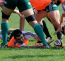 Aironi fly-half James Marshall places the ball