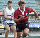 Sharks back Patrick Lambie does some resistance work at training