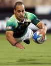 South Africa' Paul Delport dives in to score