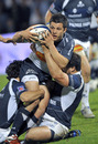 Agen winger Brice Dulin is wrapped up