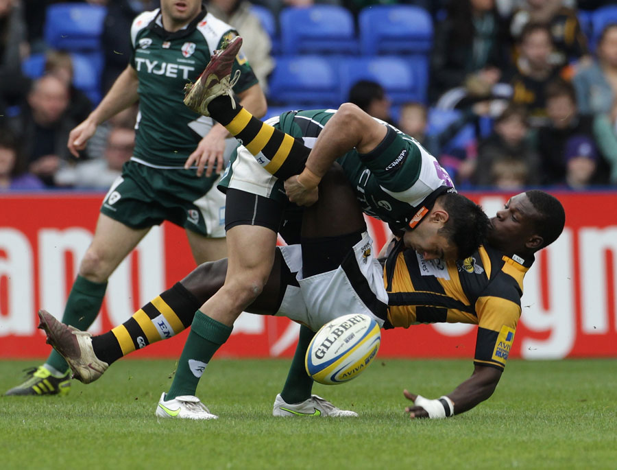 Wasps winger Christian Wade is smashed by Dan Bowden