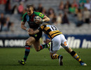 Harlequins fullback Mike Brown is tackled by Seb Jewell
