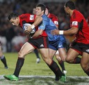 The Crusaders' Sonny Bill Williams stretches the Bulls' defence