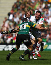 Ulster's Paddy Wallace is tackled by Phil Dowson