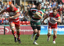 Leicester winger Horacio Agulla races away from the Gloucester cover