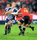 The Stormers' Schalk Burger takes on the Lions' defence