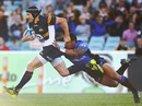 The Brumbies' Matt Giteau stretches the Western Force defence