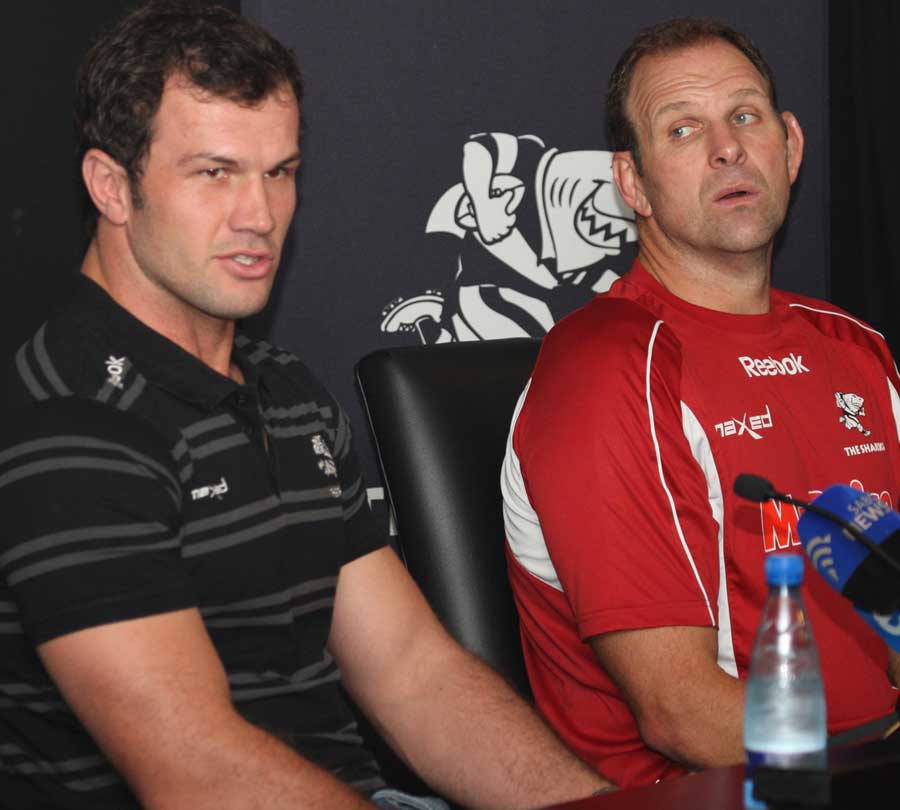 Sharks head coach John Plumtree looks at hooker Bismarck du Plessis
