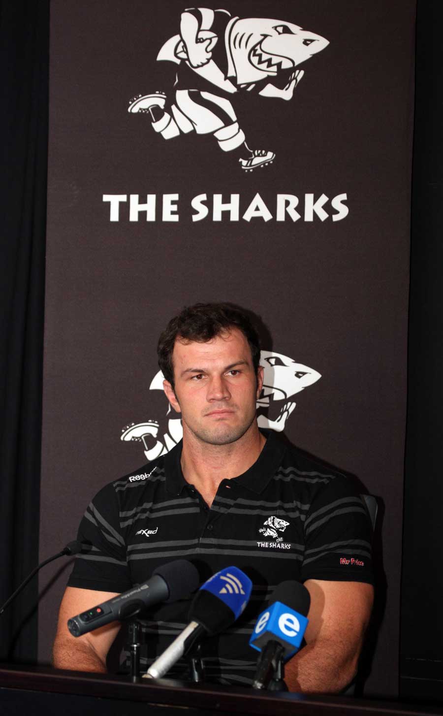 Sharks hooker Bismarck du Plessis talks to the media