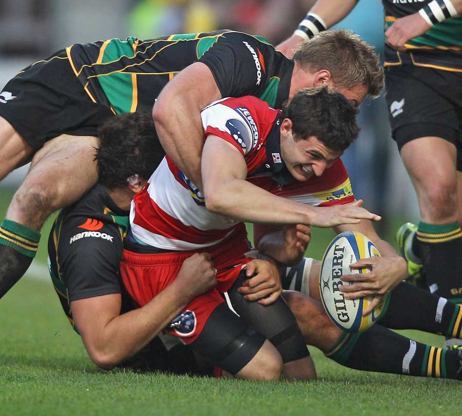 Gloucester's Jonny May is shackled by the Northampton defence