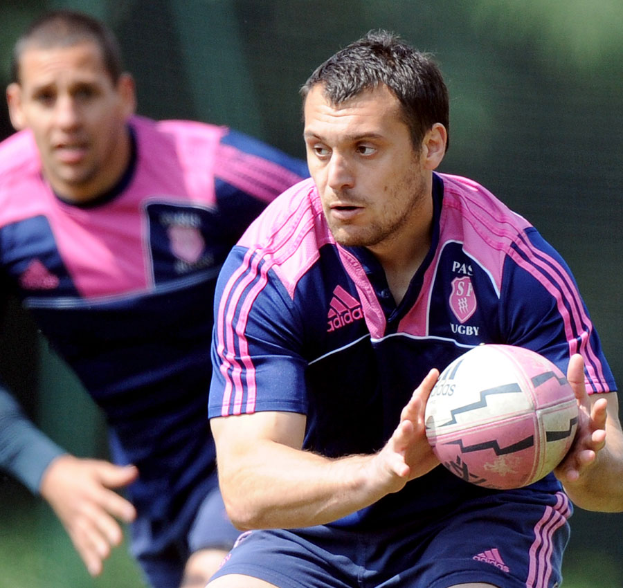 Stade Francais fly-half Lionel Beauxis prepares to pass