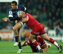 The Rebels' Peter Betham spots a gap in the Reds' defence