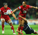 The Reds' Quade Cooper produces a sublime offload