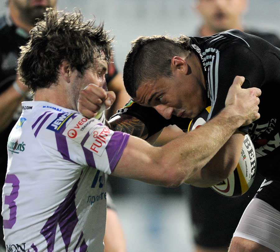 The Ospreys' Andrew Bishop goes head-to-head with Aironi's Gilberto Pavan