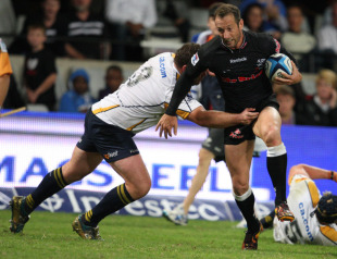 Sharks centre Stefan Terblanche breaks a tackle, Sharks v Brumbies, Super Rugby, Kings Park, Durban, South Africa, May 7, 2011