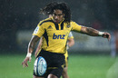 Hurricanes centre Ma'a Nonu clears his lines