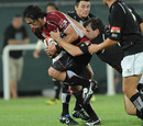 Japan captain Hitoshi Ono carries the ball forward against the UAE