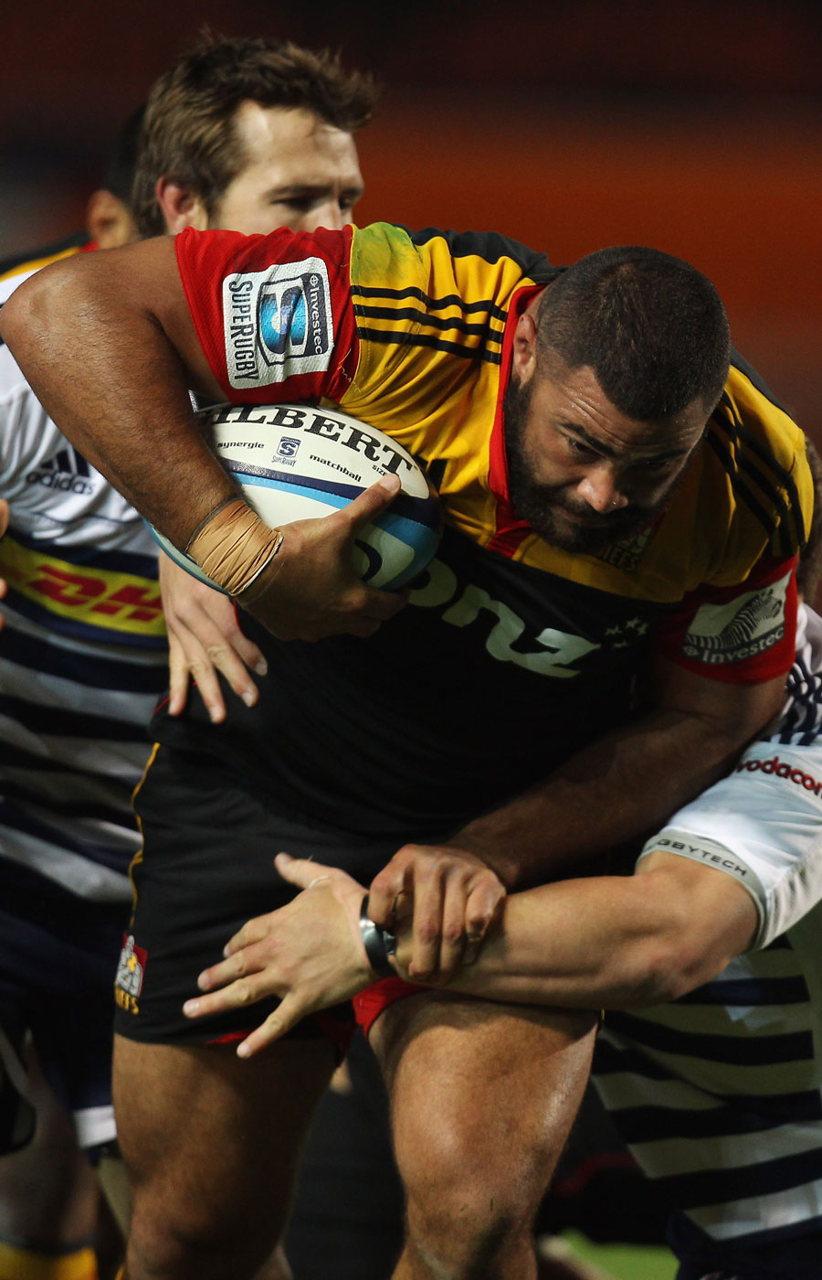 Chiefs' Fritz Lee carries the ball forward against the Stormers