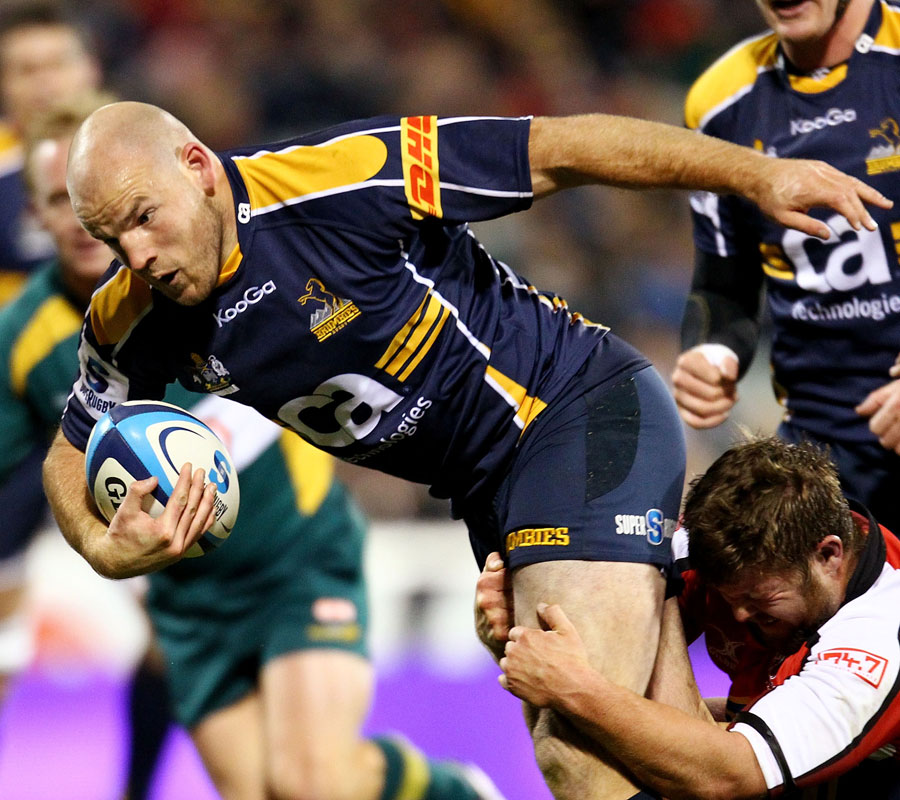 The Brumbies' Stephen Moore drives forward against the Lions