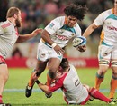 The Cheetahs' Ashley Johnson stretches the Crusaders' defence