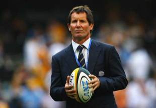 Wallabies coach Robbie Deans watches his players warm up prior to the Bledisloe Cup match between the Australian Wallabies and the New Zealand All Blacks at Hong Kong Stadium in Hong Kong, November 1, 2008.