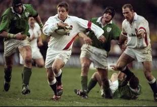 Jonny Wilkinson breaks clear of the Ireland defence during a 27-15 victory at Lansdowne Road, March 6 1999