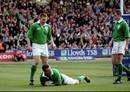 Kevin Maggs dives in to score for Ireland