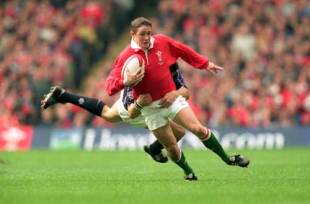 Shane Williams is tackled during a Six Nations clash with Scotland at the Millennium Stadium, March 18 2000