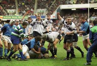 Scotland prop Tom Smith crawls over for a try against Italy at Murrayfield, March 17 2001