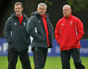 Wales Head coach Warren Gatland (C) talks with assistant coaches Robert Howley (L) and Shaun Edwards during Wales Rugby Union training at Sophia Gardens in Cardiff, Wales on November 3, 2008.