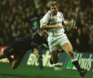Ben Cohen rounds the Scottish defence to score during a Six Nations clash at Murrayfield, February 2 2002