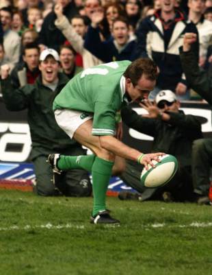 Ireland winger Denis Hickie crosses to score against Italy at Lansdowne Road, March 23 2002