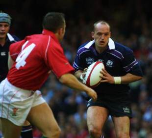 Scotland fly-half Gregor Townsend takes on Rhys Williams of Wales during a Six nations clash at the Millennium Stadium, April 6 2002