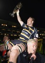 Worcester's Greg Rawlinson is chaired from the field following his last game for the club